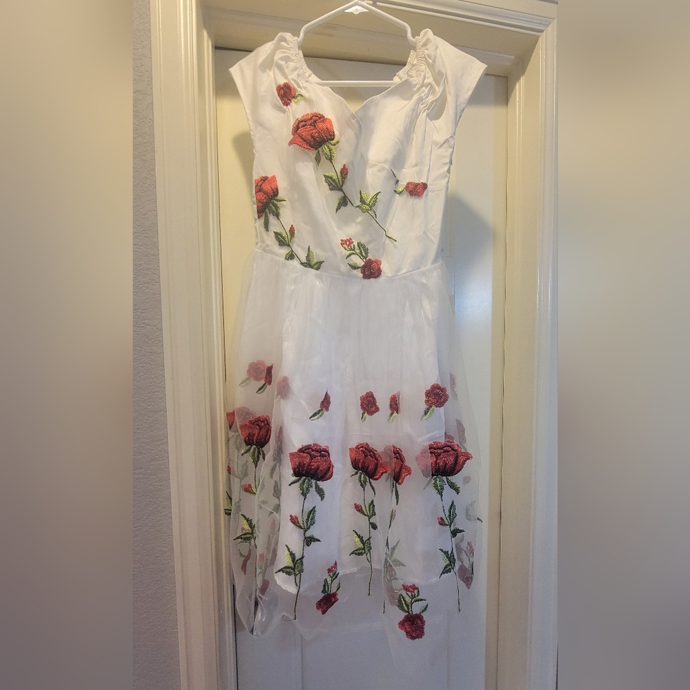 White dress with red roses